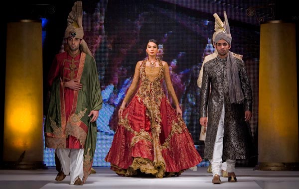 Pakistani models present creation of a Pakistani designer Nilofer Shahid during the four-day Islamabad Fashion Week. (AP)