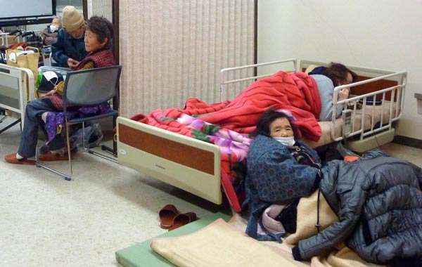 Residents take a rest at an evacuation centre in Takaharu town, Miyazaki prefecture. More than 1,000 people in southern Japan have been urged to evacuate as a volcano picked up its activities, spewing ashes and small rocks into air and disrupting airline operations, a municipal official said on Monday. (REUTERS)