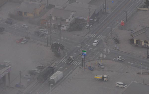 An aerial view shows volcanic ashes covering over Takaharu town caused by eruption of Shinmoedake peak, between Miyazaki and Kagoshima prefectures. (REUTERS)