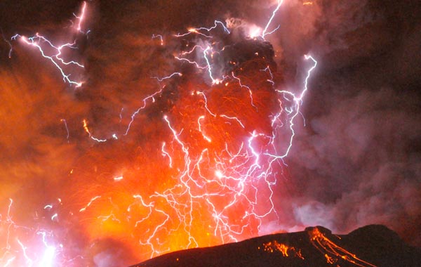 Volcanic lightning or a dirty thunderstorm is seen above Shinmoedake peak as it erupts, between Miyazaki and Kagoshima prefectures, in this photo taken from Kirishima city and released by Minami-Nippon Shimbun. (REUTERS)