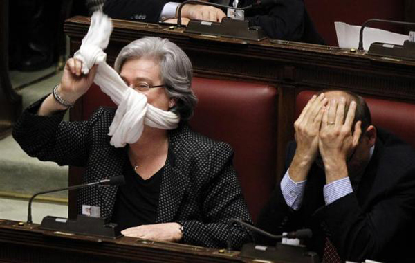 talian lawmaker Rosy Bindi (L), president of the opposition Democratic Party, reacts during a session in parliament in Rome. (REUTERS)