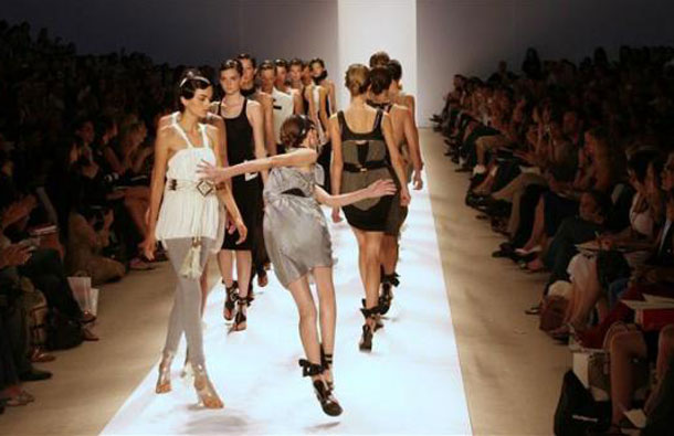 A model trips on the runway during Sass &amp; Bide's Spring Collections fashion show in New York. (REUTERS)