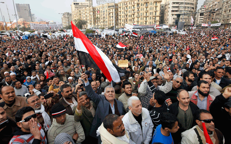 Thousands of anti-government protesters gather in Tahrir Square, Cairo, Egypt. The protests, which saw tens of thousands of people massing daily in downtown Cairo for demonstrations that at times turned violent, have raised questions about the impact on the economy. More than 160,000 foreign tourists fled the country in a matter of days last week, in an exodus sure to hammer the vital tourism sector. (AP)