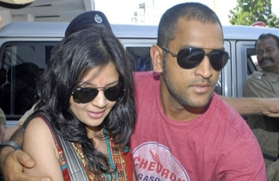 Indian cricket captain Mahendra Singh Dhoni, seen here with his wife Sakshi. Action in the World Cup will not be limited to the field with the wives and girlfriends of players all set to add sparkle to the showpiece event. (AFP)