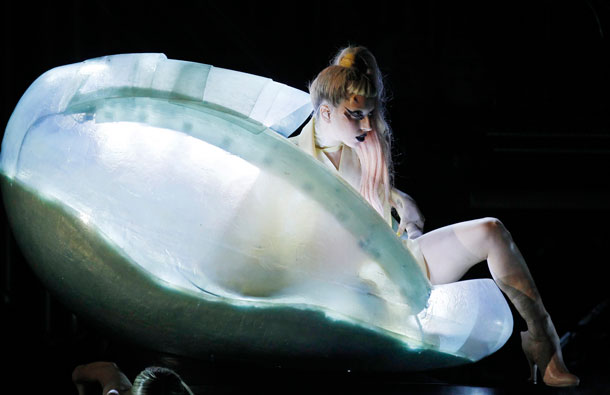Lady Gaga steps out of a translucent egg to perform her new song "Born This Way" at the 53rd annual Grammy Awards in Los Angeles, California. (REUTERS)