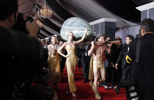 Lady Gaga, being carried in an egg-shaped vessel, arrives at the 53rd annual Grammy Awards in Los Angeles, California. (REUTERS)