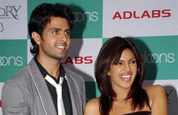 Bollywood actors Priyanka Chopra (R) and Harman Baweja smile during the promotional event of their forthcoming movie "Love Story 2050" in Mumbai June 28, 2008. (REUTERS)