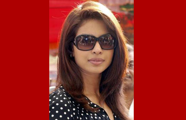 Bollywood actress Priyanka Chopra poses for a picture during her visit to a medical camp in Mumbai December 13, 2008. (REUTERS)