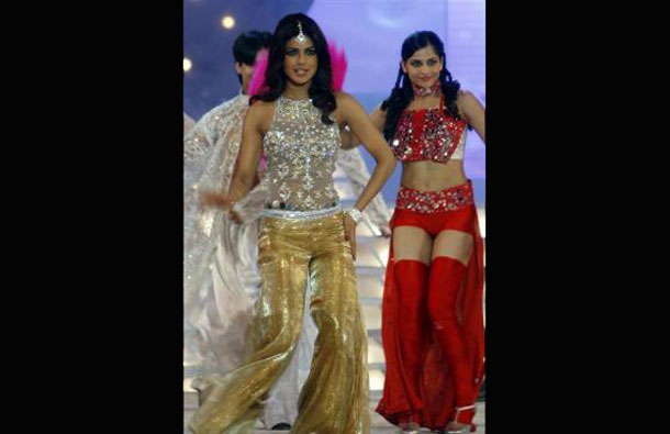 Bollywood star Priyanka Chopra (L) performs during the Miss India Pageant 2009 in Mumbai April 5, 2009. (REUTERS)