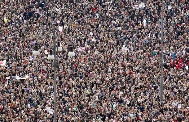 Protesters gather in Rome's Piazza del Popolo to demonstrate against Italy's Prime Minister Silvio Berlusconi. Women rallied across Italy on Sunday, incensed by Prime Minister Silvio Berlusconi's sex scandal which they say has hurt their dignity and reinforced outdated gender stereotypes. (REUTERS)