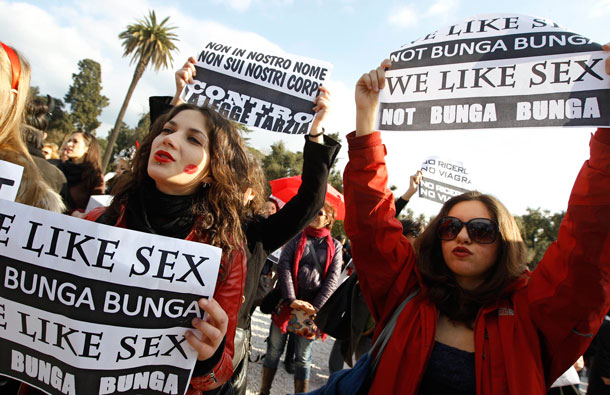 Women hold placards during a demonstration against Italy's Prime Minister Silvio Berlusconi in downtown Rome. Women rallied across Italy on Sunday, incensed by Berlusconi's sex scandal which they say has hurt their dignity and reinforced outdated gender stereotypes. (REUTERS)