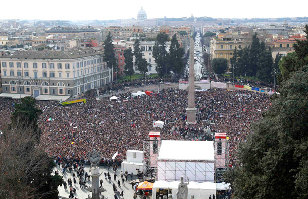 People gather in Rome's Piazza del Popolo to demonstrate against Italy's Prime Minister Silvio Berlusconi. Women rallied across Italy on Sunday, incensed by Berlusconi's sex scandal which they say has hurt their dignity and reinforced outdated gender stereotypes. (REUTERS)