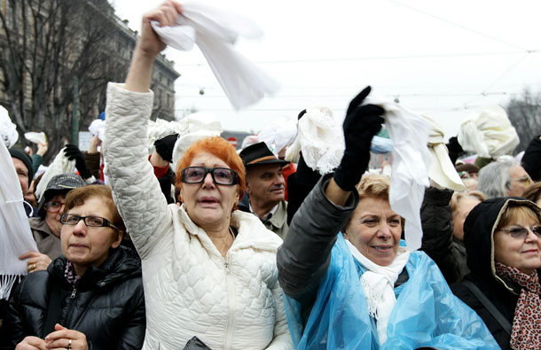 People gather during a national demonstration to appeal for greater dignity for Italian women at Piazza Castello in Milan, Italy. Women rallied across Italy incensed by Prime Minister Silvio Berlusconi's sex scandal which they say has hurt their dignity and reinforced outdated gender stereotypes. (GETTY IMAGES)
