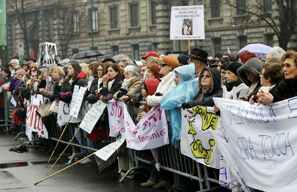 People gather during a national demonstration to appeal for greater dignity for Italian women at Piazza Castello in Milan, Italy. Women rallied across Italy incensed by Prime Minister Silvio Berlusconi's sex scandal which they say has hurt their dignity and reinforced outdated gender stereotypes. (GETTY IMAGES)