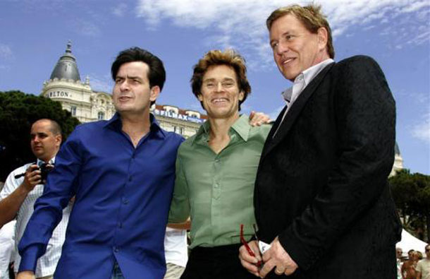 The cast of US director Oliver Stone's film 'Platoon' reunites for the film's 20th anniversary during the 59th Cannes Film Festival May 21, 2006. From left are actors Charlie Sheen, Willem Dafoe and Tom Berenger. (REUTERS)