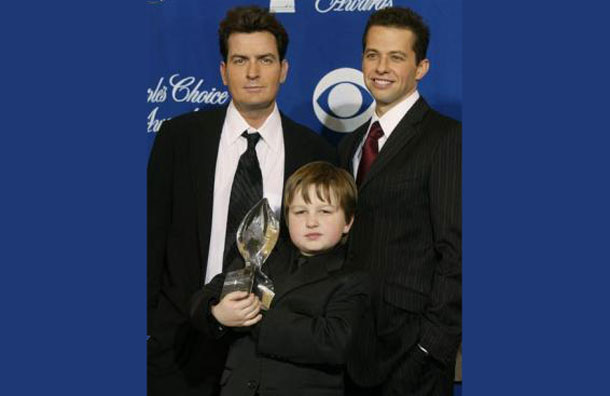 The cast of 'Two and a Half Men,' Charlie Sheen (L) Angus T. Jones, and Jon Cryer (R) pose back stage after winning the favorite new television comedy series at the 30th annual People's Choice Awards in Pasadena, California January 11, 2004. (REUTERS)