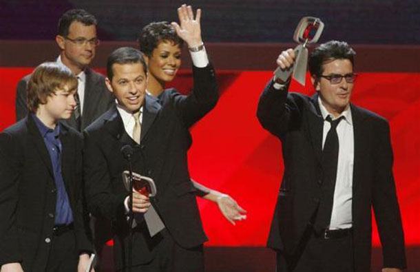 Cast members of "Two and A Half Men" (L-R) Angus T. Jones, Jon Cryer and Charlie Sheen accept the Future Classic award at the taping of the seventh annual TV Land Awards in Los Angeles, California April 19, 2009. (REUTERS)