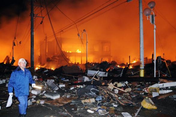 Houses lie flattened after a powerful earthquake in Iwaki, Fukushima Prefecture. (REUTERS)