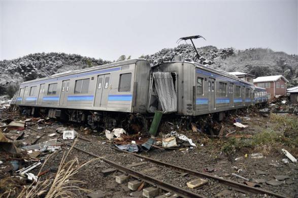 A damaged train is seen after an earthquake and tsunami in Matsushima City, Miyagi Prefecture. (REUTERS)