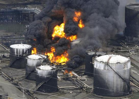 A factory facility burns following an earthquake and tsunami in Sendai, northeastern Japan. (REUTERS)