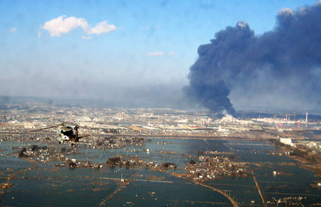 In this handout image provided by U.S. Navy, an aerial view of tsunami and earthquake damage is seen from an SH-60B helicopter assigned to the Chargers of Helicopter Antisubmarine Squadron (HS) 14 from Naval Air Facility Atsugi March 12, 2011 seen from the air of Sendai, Japan. An earthquake measuring 8.9 on the Richter scale has hit the northeast coast of Japan causing tsunami alerts throughout countries bordering the Pacific Ocean. (GETTY IMAGES)