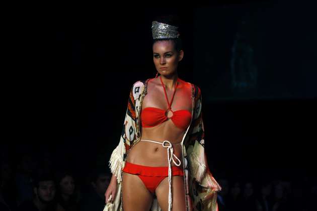 Indian model display designer Pria Kataaria Puri creations during the Lakme Fashion Week in Mumbai, India. (AP)