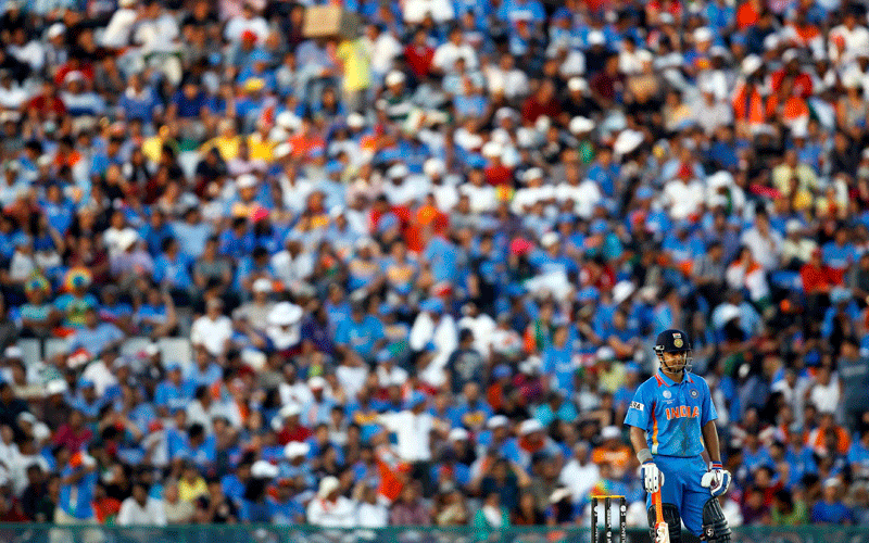 India's Suresh Raina waits for an incoming batsman after the dismissal of Ashish Nehra during their ICC Cricket World Cup 2011 semi-final match against Pakistan in Mohali March 30, 2011 (REUTERS)