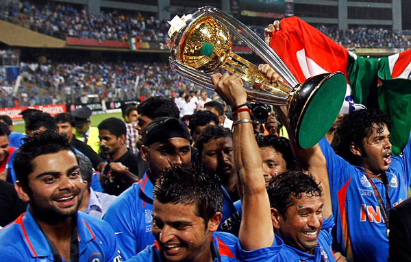India's Virat Kohli, Suresh Raina, Harbhajan Singh, Sachin Tendulkar and Shanthakumaran Sreesanth (L-R) celebrate after India won their ICC Cricket World Cup final match against Sri Lanka in Mumbai. (REUTERS)