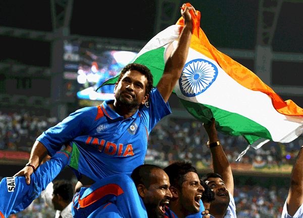 India’s Sachin Tendulkar celebrates his team’s win during the World Cup final against Sri Lanka at the Wankhede Stadium on Saturday in Mumbai, India. (GETTY)