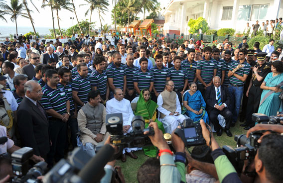 The Indian cricket team poses for a gruop photo with Indian President Pratibha Patil (front C, in green sari) during a tea party at the Governor's House in Mumbai on April 3, 2011. India won the Cricket World Cup for the first time since 1983 with a six-wicket victory over Sri Lanka. (AFP)