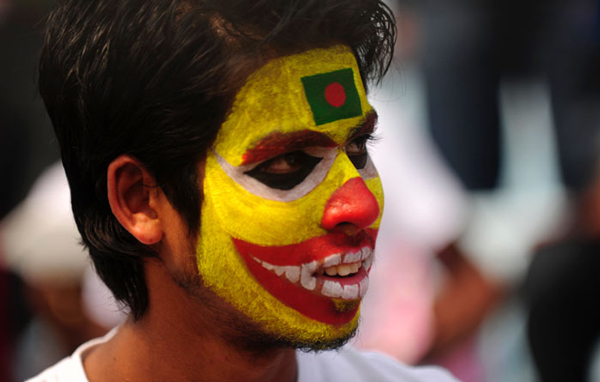 If Mink painted her, this Bangladeshi fan had his face painted in the national colours before the first match of the Cricket World Cup 2011. (AFP)