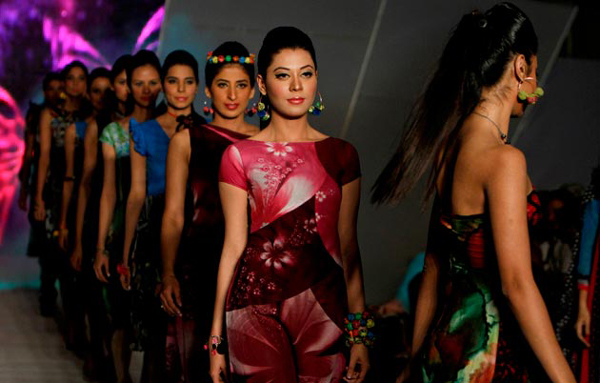 Models present creations by Pakistani designer Hira Lari during a fashion show in Karachi, Pakistan. (AP)