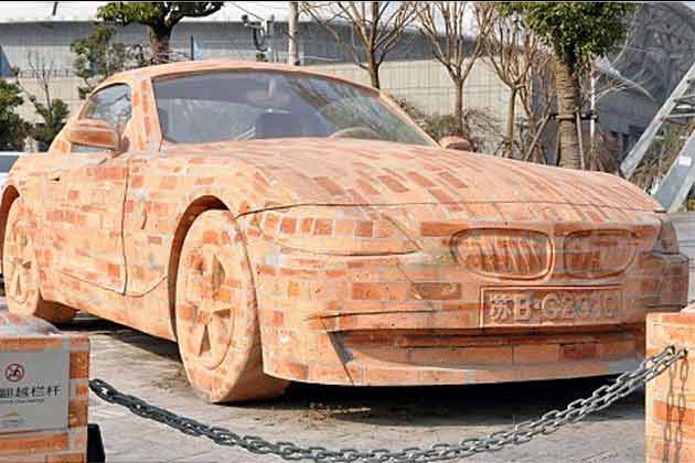 The sporty BMW Z4 brick model can exceed speeds of 150mph. Except for the windows, everything is made from brick, even the hinges that allow the door to open and close. (AP)