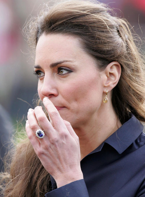 A file picture dated 11 April 2011 shows Kate Middleton looking at the Witten Country Park in Darwen, Britain. According to media reports on the bride-to-be will have her sapphire and diamond engagement ring resized in time for the royal wedding that will take place in London on April 29, 2011 (EPA)