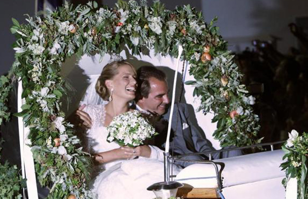 Prince Nikolaos, son of Greece's deposed King Constantine, and his bride Tatiana Blatnik leave Agios Nikolaos church after their wedding ceremony on the Greek island of Spetses, August 25, 2010. (REUTERS)