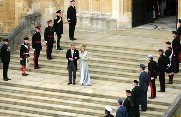 Prince Charles and The Duchess of Cornwall leave St. George's Chapel in Windsor Castle after the Service of Prayer and Dedication following their marriage, April 9, 2005. (REUTERS)
