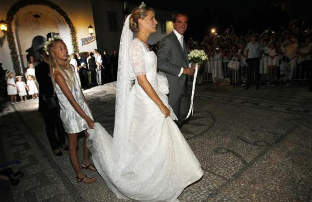 Prince Nikolaos, son of Greece's deposed King Constantine, and his bride Tatiana Blatnik leave Agios Nikolaos church after their wedding ceremony on the island of Spetses, August 25, 2010. (REUTERS)