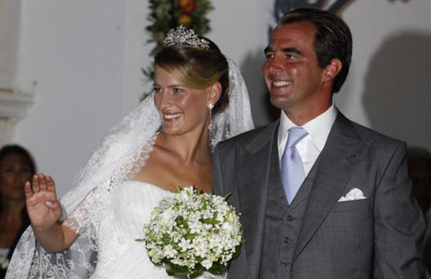 Prince Nikolaos, son of Greece's deposed King Constantine, and his bride Tatiana Blatnik leave Agios Nikolaos church after their wedding ceremony on the Greek island of Spetses, August 25, 2010. (REUTERS)