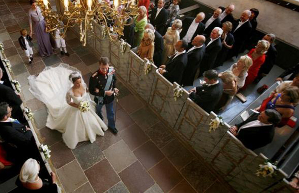 Denmark's Prince Joachim and his bride Princess Marie leave the church following their wedding in Mogeltonder, May 24, 2008. (REUTERS)