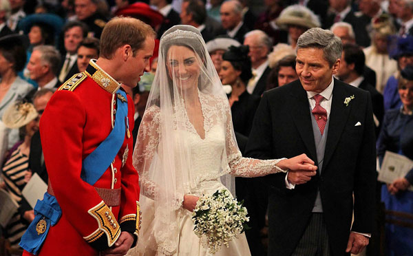 Prince William, his bride Kate Middleton with her father Michael Middleton during the wedding ceremony at Westminster Abbey, London, Britain, 29 April 2011. Westminster Abbey has a long tradition as a venue for royal weddings, going back to 1100. William's grandparents, Queen Elizabeth II and Prince Philip, Duke of Edinburgh, exchanged their vows there in 1947 (EPA)