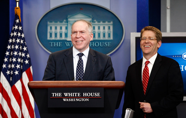 John Brennan (L), assistant to the president for homeland security and counterterrorism, and White House Press Secretary Jay Carney smile as they take the rostrum to speak about the killing of Osama bin Laden from the Briefing Room of the White House in Washington. (REUTERS)