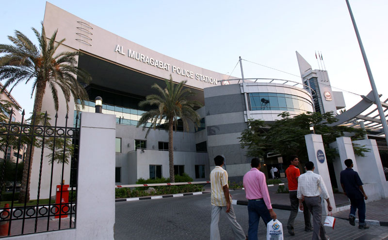 Pedestrians walk by Al Muraqabat Police Station in Dubai. (FILE)