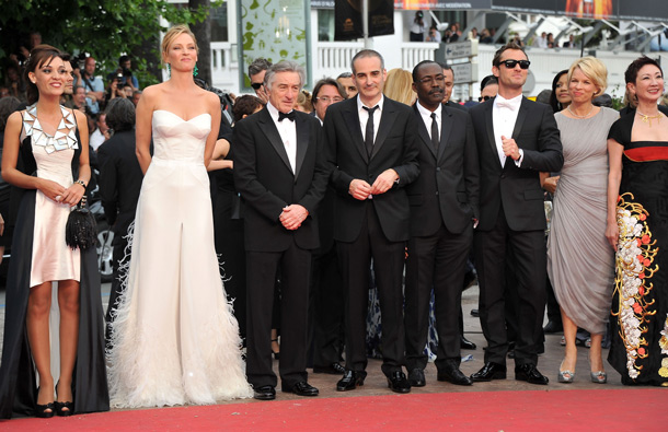 (L-R) Jury Members Martina Gusman, Uma Thurman, Robert De Niro, Olivier Assayas, Mahamat-Saleh Haroun, Jude Law, Linn Ullmann and Nansun Shi attend the Opening Ceremony at the Palais des Festivals during the 64th Cannes Film Festival on May 11, 2011 in Cannes, France. (GETTY/GALLO)