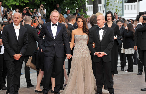 Actress Salma Hayek with husband Francois-Henri Pinault (L)and producer Jeffrey Katzenberg (R) attends the Opening Ceremony at the Palais des Festivals during the 64th Cannes Film Festival on May 11, 2011 in Cannes, France. (GETTY/GALLO)