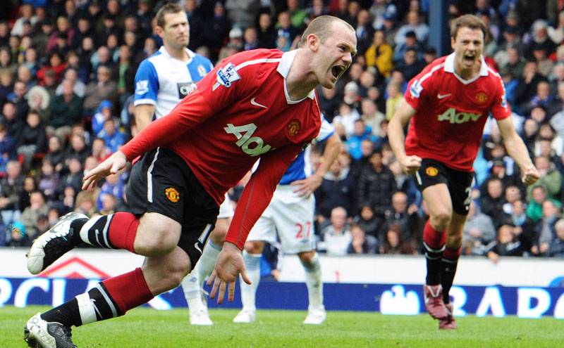 Manchester United's Wayne Rooney celebrates scoring against Blackburn Rovers during their English Premier League soccer match in Blackburn, northern England. (REUTERS)