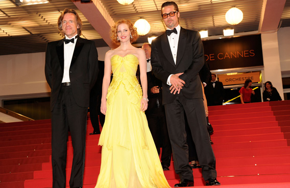 (L-R) Producer Bill Pohlad, actress Jessica Chastain and actor Brad Pitt depart "The Tree Of Life" premiere during the 64th Annual Cannes Film Festival at Palais des Festivals on May 16, 2011 in Cannes, France. (GETTY/GALLO)