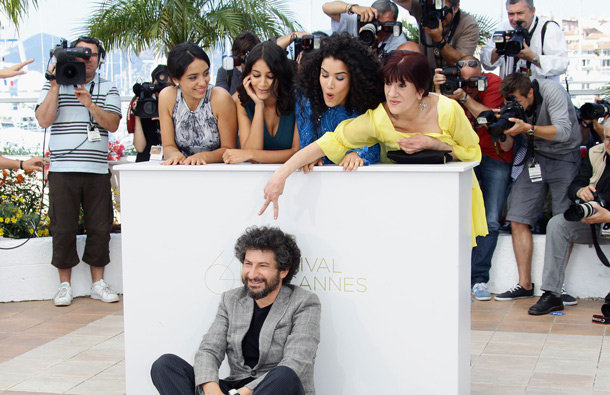 Director Radu Mihaileanu (front) with actresses (L-R) Hiam Abbas, Hafsia Herzi, Leila Bekhti, Sabrina Ouazani and Biyouna attend the "La Source Des Femmes" Photocall at Palais des Festivals during 64th Annual Cannes Film Festival in Cannes, France. (GETTY/GALLO)