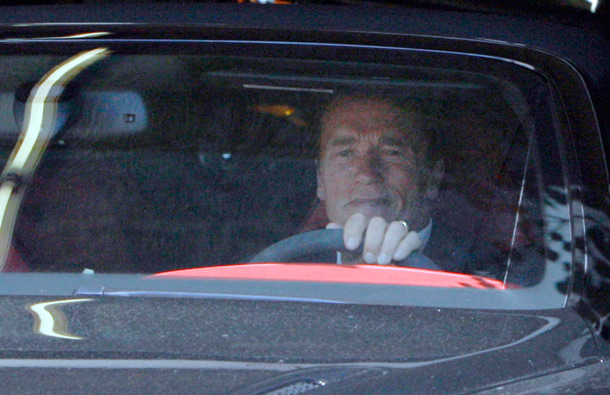 Former California Governor Arnold Schwarzenegger leaves his office in Santa Monica, Calif. Schwarzenegger acknowledged Tuesday that he fathered a child with a member of his household staff, a revelation that apparently prompted wife Maria Shriver to leave the couple's home before they announced their separation. (AP)