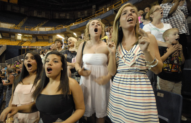 American Idol fans react to the announcement the McKenzie Arena in Chattanooga, Tenn. The fans were on hand at a watching party to support local favorite Lauren Alania, who was runner-up to Idol winner Scotty McCreery. (AP)