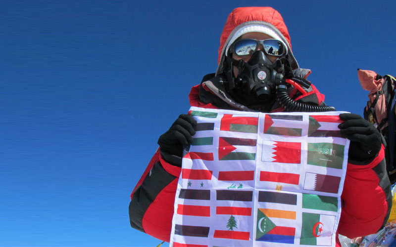Suzanne Al Houby at the summit of Everest. (SUPPLIED)